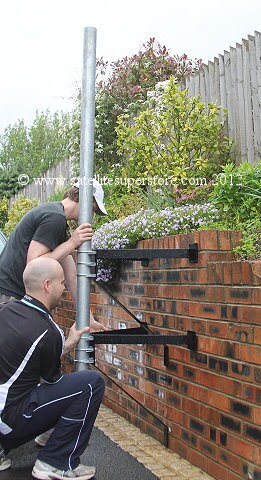 Heavy duty above the gutter wall mount.